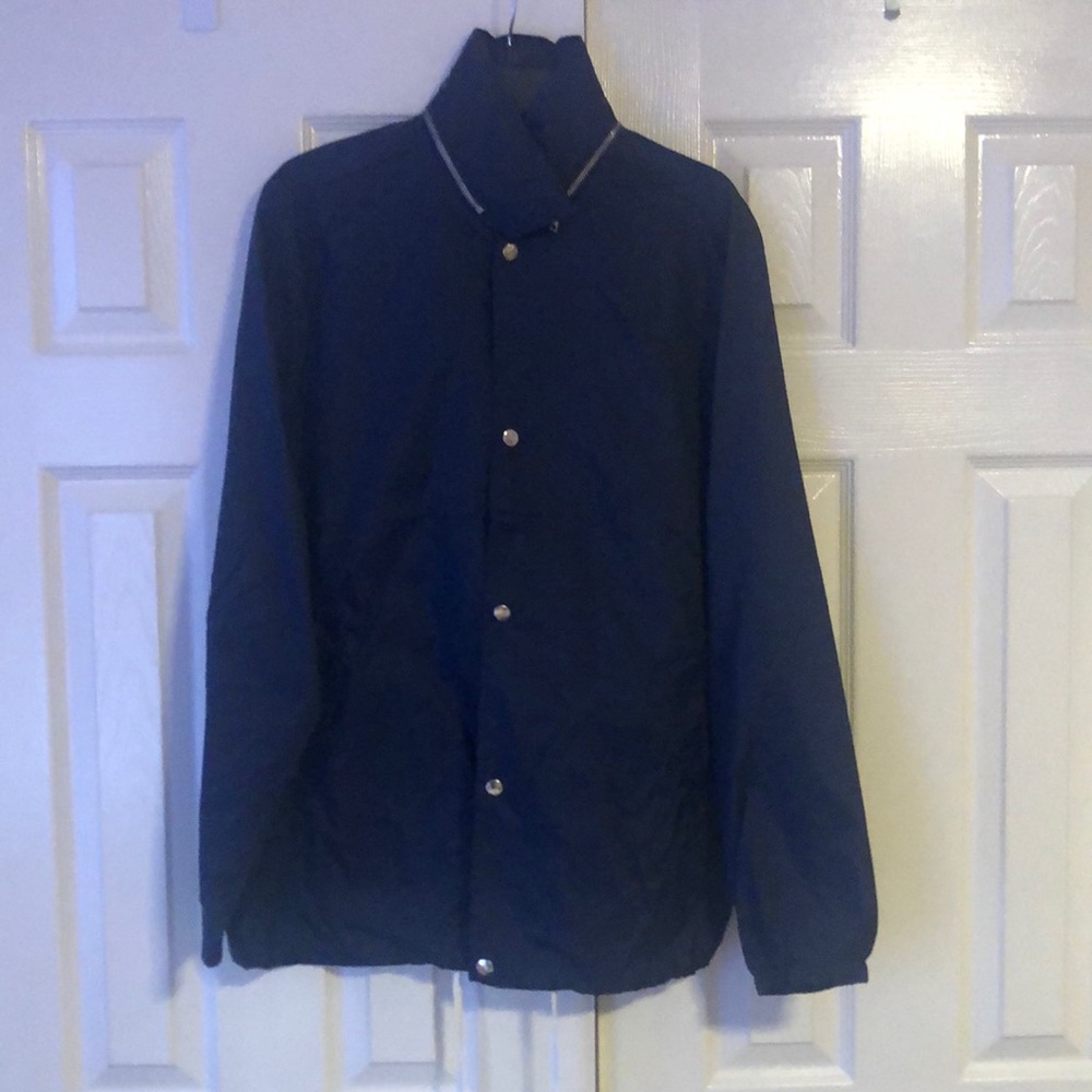 NWT. Five Four windbreaker with zipper hood.  Navy. Size Large.